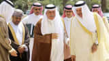 Saudi Arabia's Finance Minister Ibrahim Alassaf (front, 2nd R) walks with Gulf Cooperation Council (GCC) Secretary-General Abdulatif al-Zayani (front R) to attend a meeting of Gulf Arab monetary and finance officials in Riyadh October 5, 2013.
