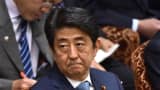 Japanese Prime Minister Shinzo Abe attending a budget committee session of the House of Councillors in Tokyo on May 13, 2016.