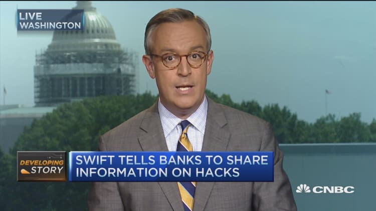 SWIFT tells banks to share info on hacks