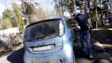 Christian Blakseth charges his electric car's batteries in Oslo, Norway.