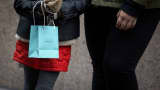 A pedestrian holds a Tiffany shopping bag in New York.