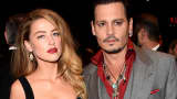 Actors Amber Heard (L) and Johnny Depp attend the 'Black Mass' premiere during the 2015 Toronto International Film Festival at The Elgin on September 14, 2015 in Toronto, Canada.