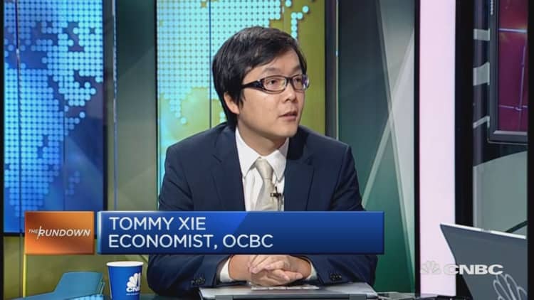 OCBC: Yuan basket system is positive for investors