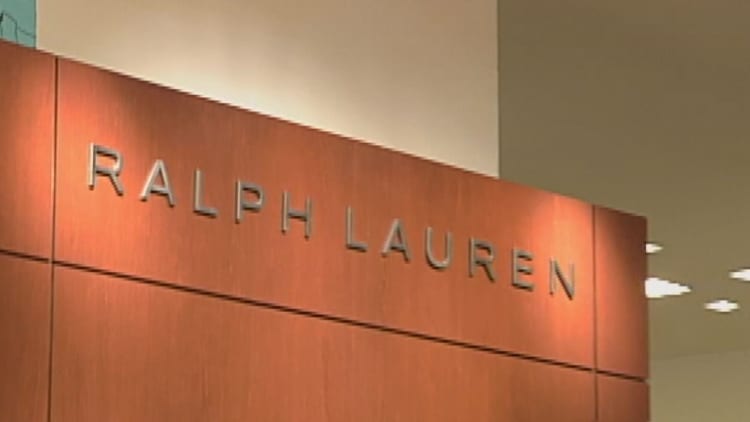 Ralph Lauren plans to cut management, close stores