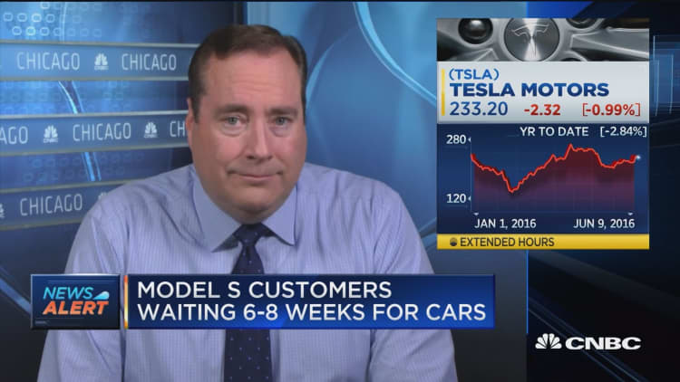 Tesla lowers Model S price to meet demand