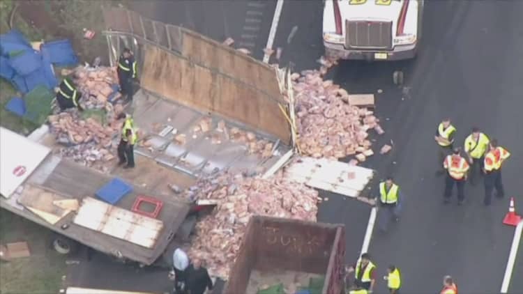 Deli meat truck collides with bread truck, creating messy commute