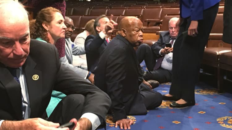 Dems stage sit-in and Trump strikes back
