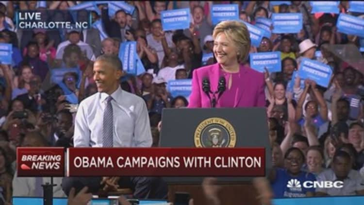 Obama campaigns with Clinton