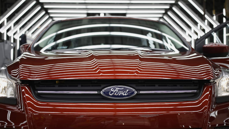 Ford beats Street on top and bottom line
