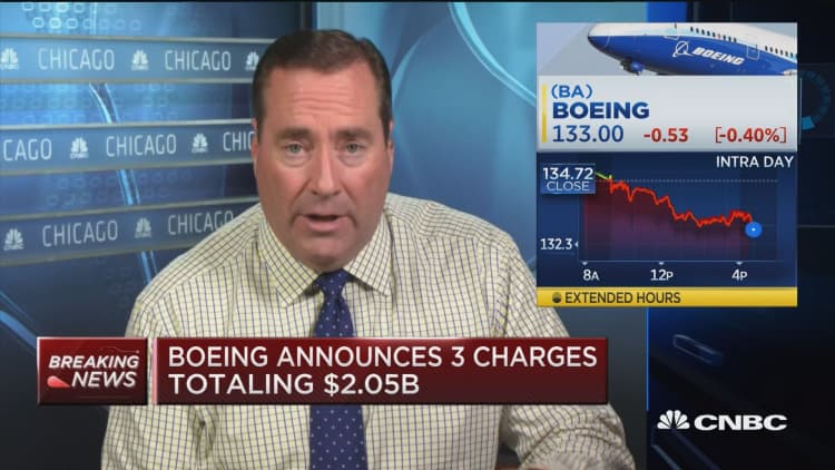 Boeing announces 3 charges totaling $2.05B