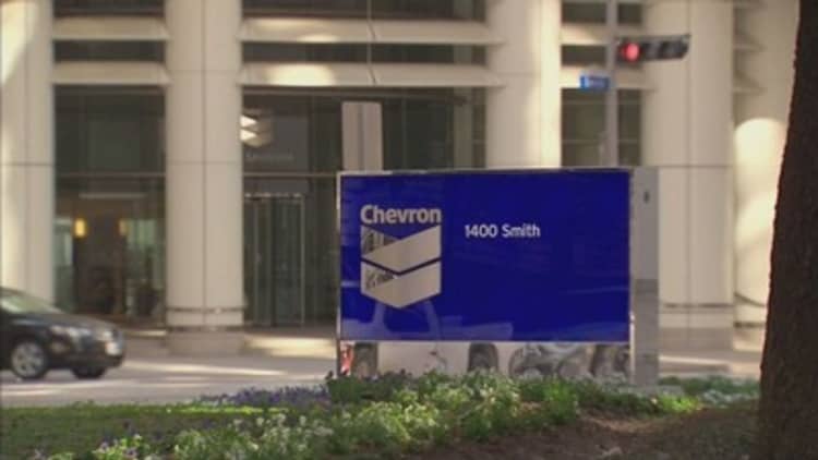 Chevron posts third straight quarterly loss