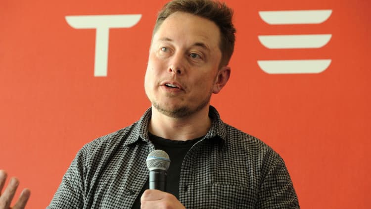 Here's what happened at Tesla's investor day and what it means for the stock