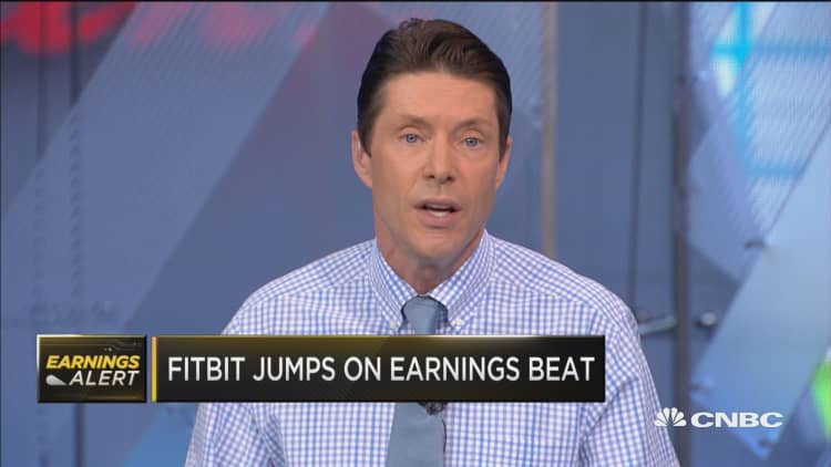 Fitbit jumps on earnings beat