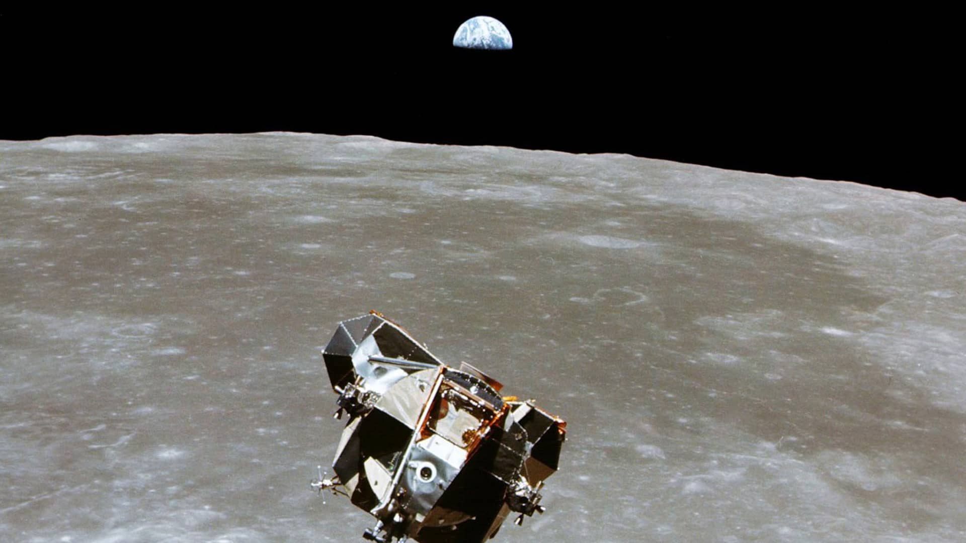 The Apollo 11 Lunar Module ascent stage, with astronauts Neil A. Armstrong and Edwin E. Aldrin Jr. aboard, is photographed from the Command and Service Modules in lunar orbit in this July, 1969 file handout photo.