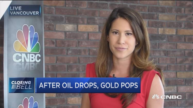 After oil drops, gold pops