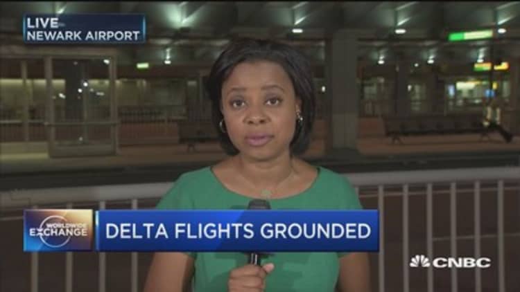 Delta flights grounded after system outage 