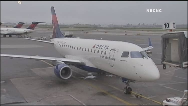 Delta computer outage causes flight delays worldwide