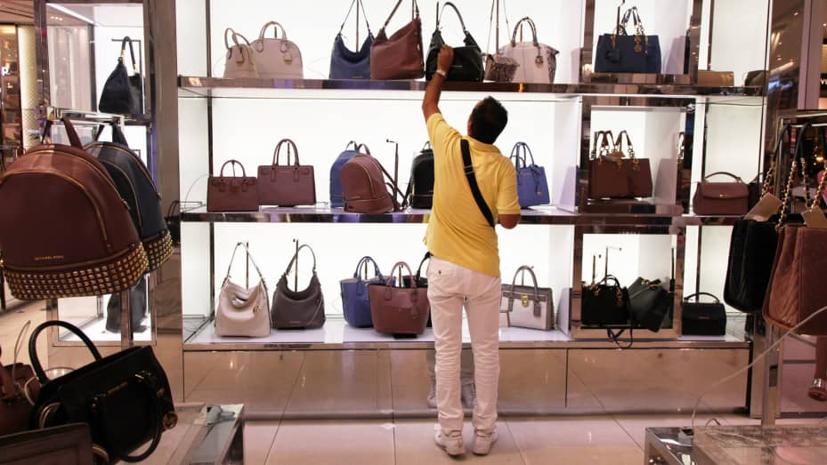 Michael Kors to close up to 125 stores as luxury retail woes deepen
