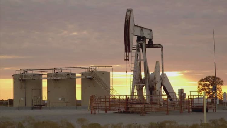 IEA lowers oil demand forecast