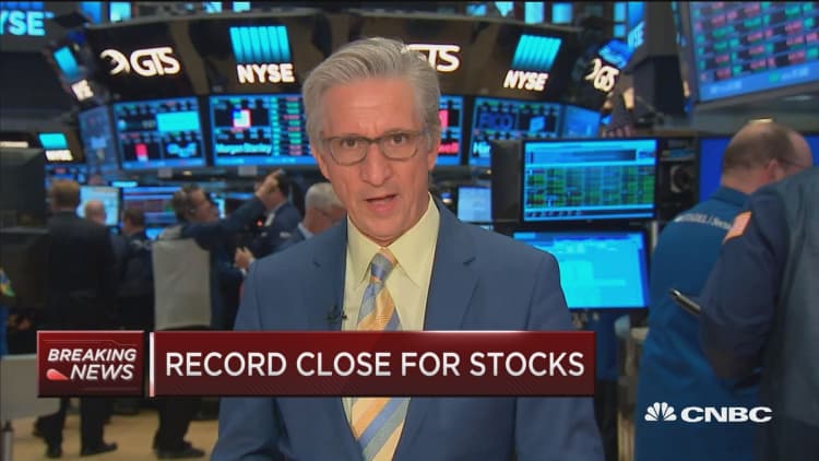 Dow, S&P, Nasdaq close at record highs