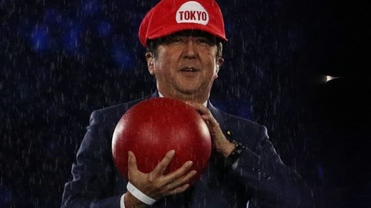 Olympics: Japan's Abe dresses up as Super Mario