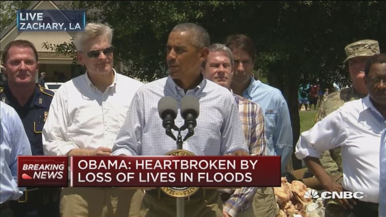 Obama: Heartbroken by loss of lives in floods