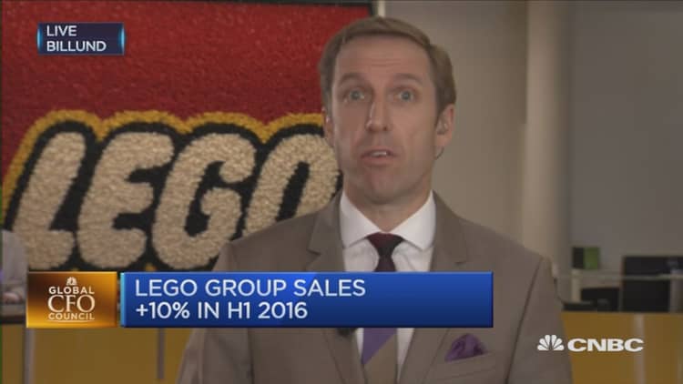 LEGO looks to back up bricks with clicks