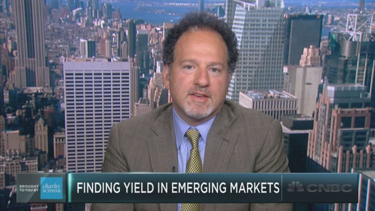 Investors pile into emerging market debt