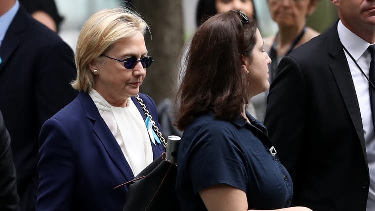 Clinton stumbles after pneumonia diagnosis