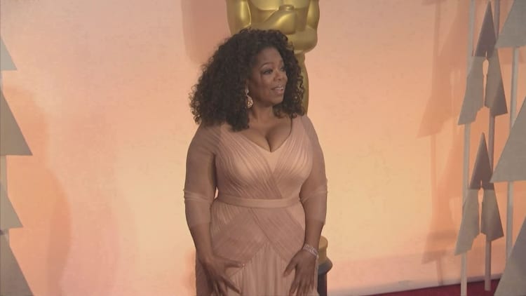 Oprah suffers $117M Weight Watchers loss on paper