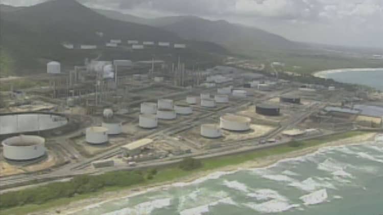 Venezuela says oil supply exceeds demand