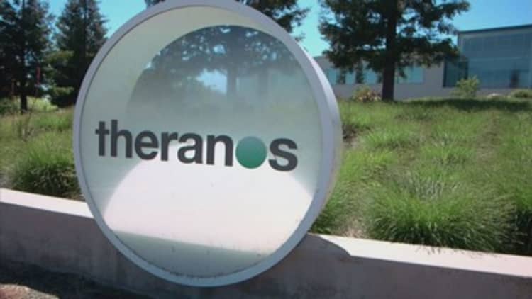 Theranos to close wellness centers and clinical labs