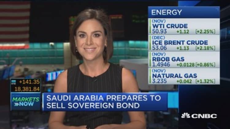 Oil gains on OPEC deal optimism