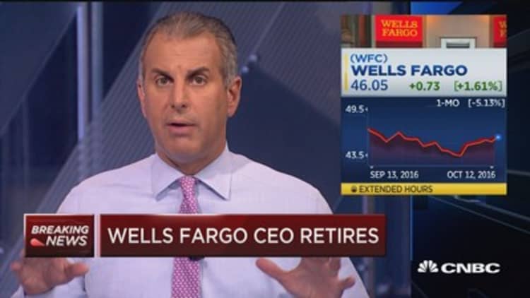Wells Fargo CEO retires, shares higher