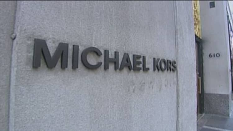 M&A chatter drives Michael Kors stock higher