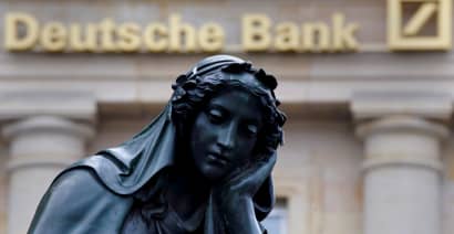 Deutsche Bank shares slide after sudden spike in the cost of insuring against its default