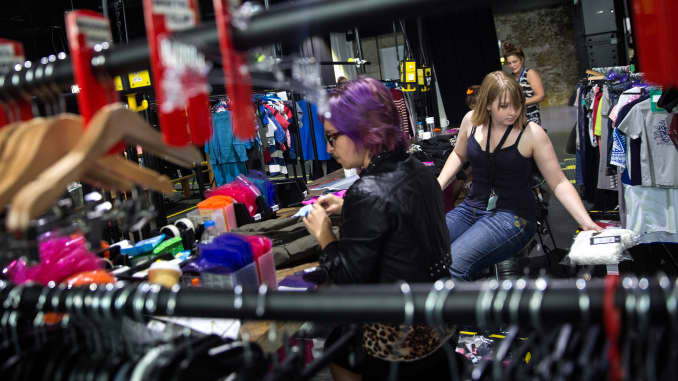 Employees make preparations for a launch party at Amazon.com Inc.'s new fashion photography studio in the Shoreditch district of London, U.K.
