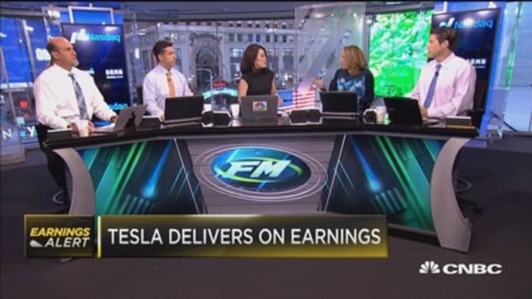 Tesla delivers on earnings