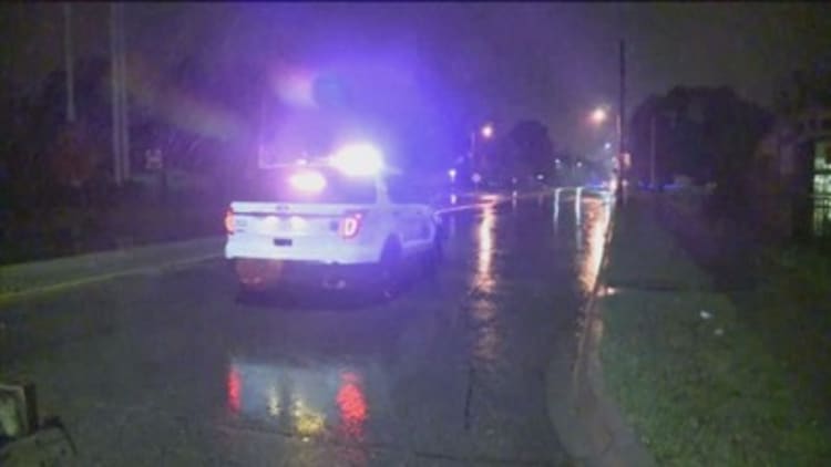 Suspect in Iowa police shooting in custody