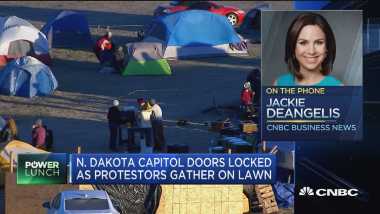 N. Dakota Capitol doors locked as protestors gather on lawn
