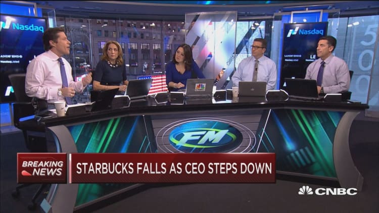 Starbucks falls as CEO steps down