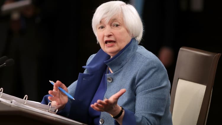 Fed raises interest rates by one-quarter point