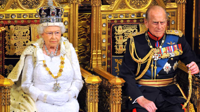Queen Elizabeth II sits with Prince Philip as she delivers her speech during opening ceremony of Parliament in the House of Lords at Westminster on June 4, 2014, in London.