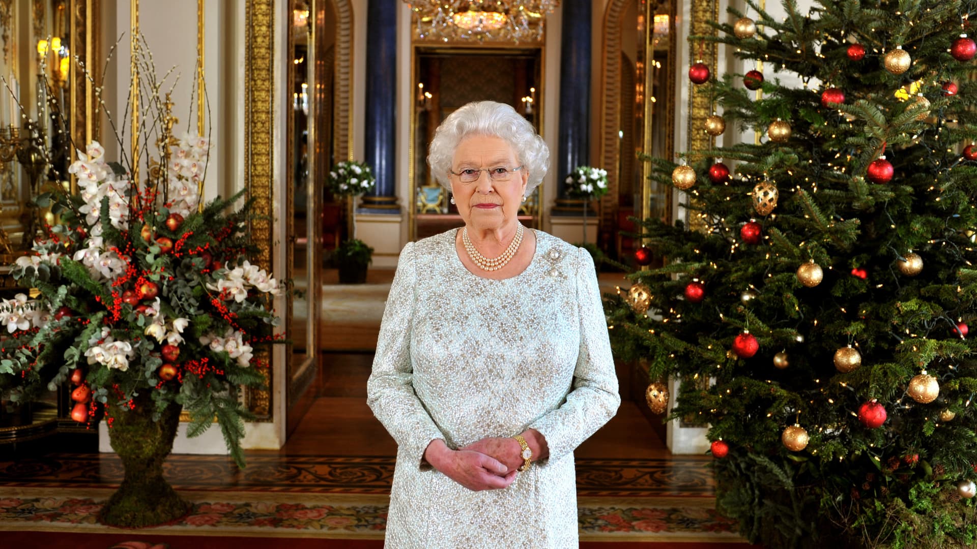 Queen Elizabeth II records her Christmas message to the Commonwealth, in the White Drawing Room at Buckingham Palace