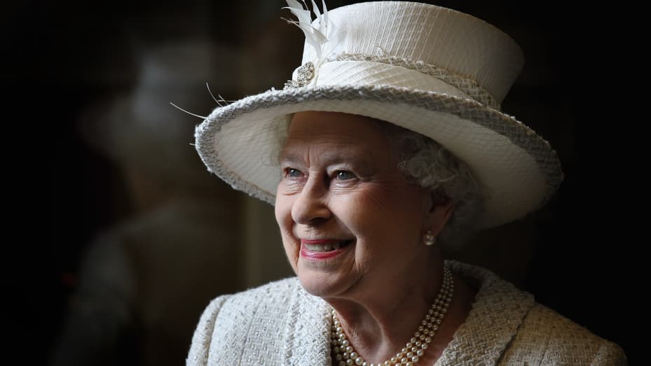 Queen Elizabeth II smiles as she visits Cyfarthfa High School and Castle on April 26, 2012