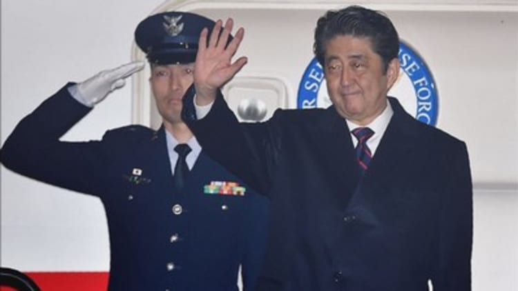 Japan's Abe arrives for historic visit to Pearl Harbor with Obama