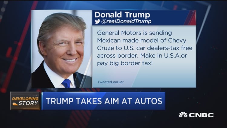 Trump takes aim at autos
