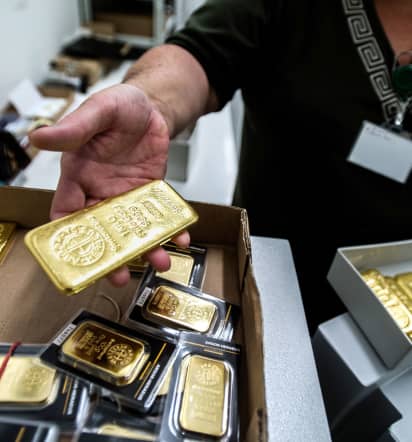 Gold jumps as dollar retreats post U.S. jobs data, ECB decision 