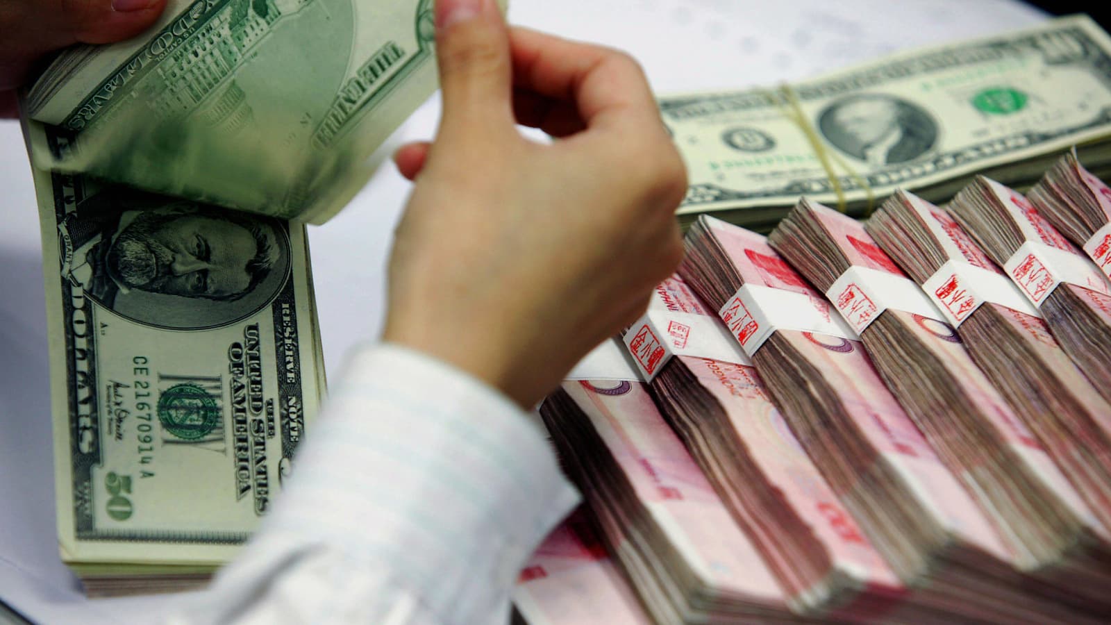 China is working hard to support its currency — it sold US government bonds  for six straight months