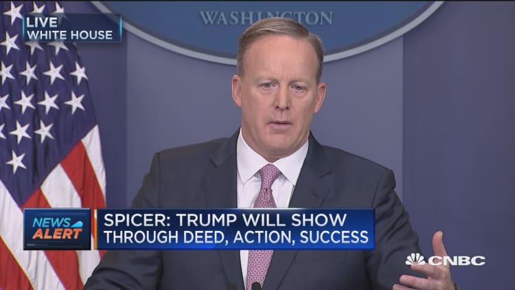 Spicer: Trump will show through deed, action, success